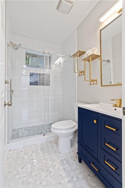 532 Coffee Cove Dr, Jasper, GA 30143 - full bathroom featuring toilet, vanity, and a stall shower