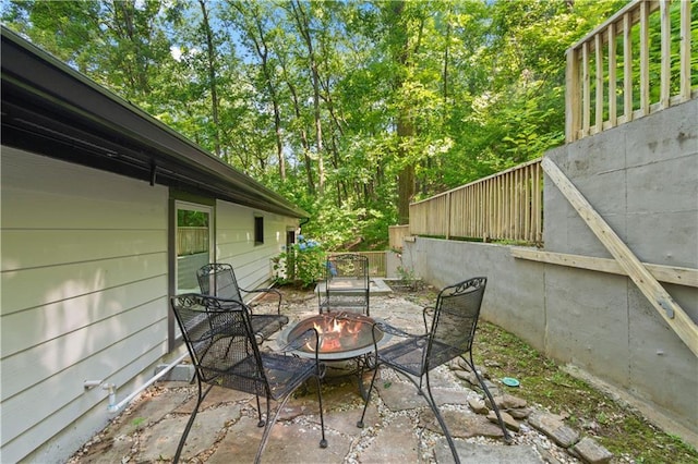 532 Coffee Cove Dr, Jasper, GA 30143 - view of patio / terrace with an outdoor fire pit