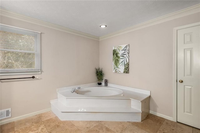 bathroom featuring ornamental molding, a bath, tile patterned flooring, and a textured ceiling