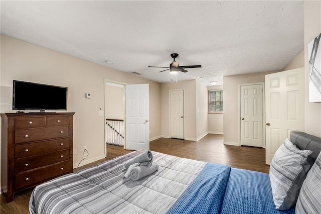 bedroom with ceiling fan and wood-type flooring