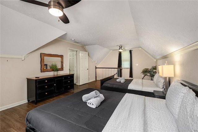 bedroom featuring ornamental molding, vaulted ceiling, dark hardwood / wood-style flooring, and ceiling fan