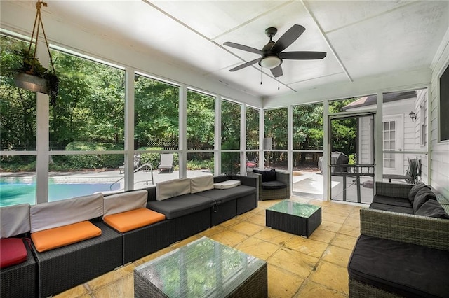 sunroom / solarium with ceiling fan