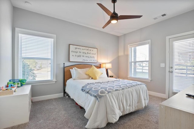 bedroom featuring carpet flooring, visible vents, and baseboards
