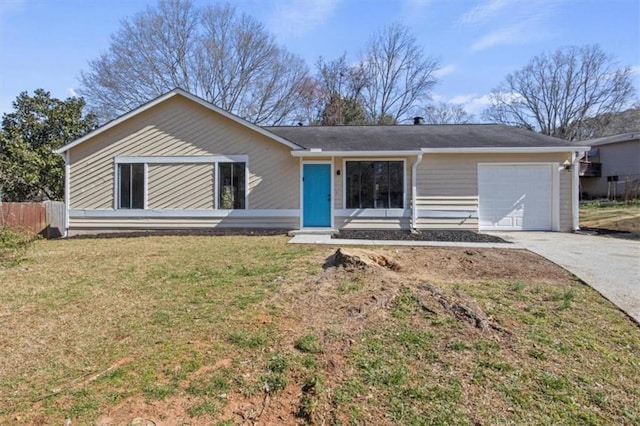 ranch-style house with a front yard, concrete driveway, fence, and an attached garage