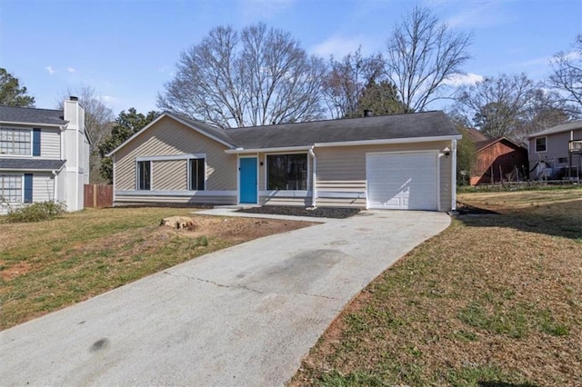 ranch-style home with a front yard, driveway, and an attached garage