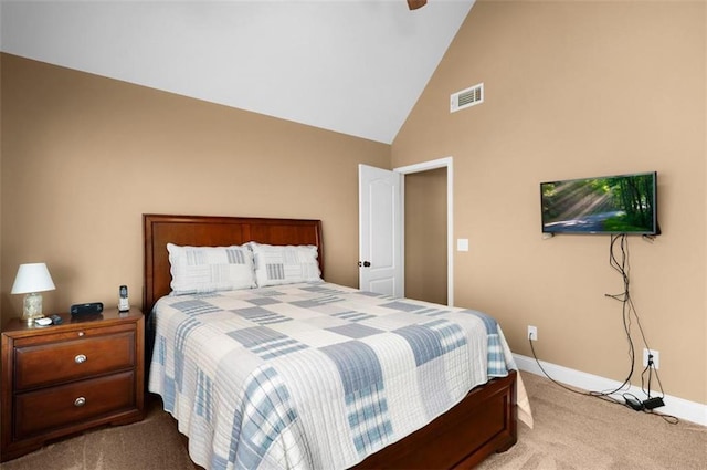 carpeted bedroom with visible vents, a ceiling fan, baseboards, and high vaulted ceiling