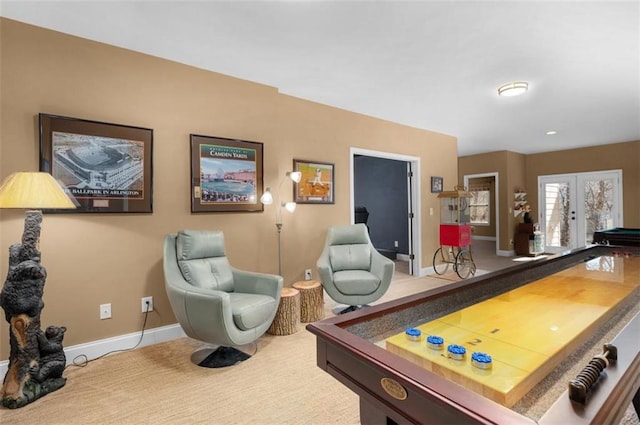 game room with carpet, french doors, and baseboards