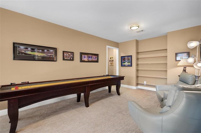 playroom with light carpet, visible vents, and baseboards