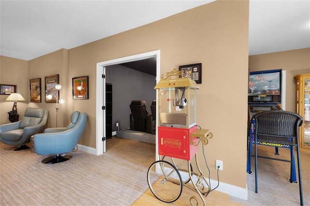 interior space with baseboards and carpet flooring