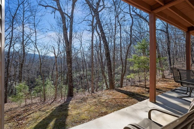 view of yard featuring a view of trees