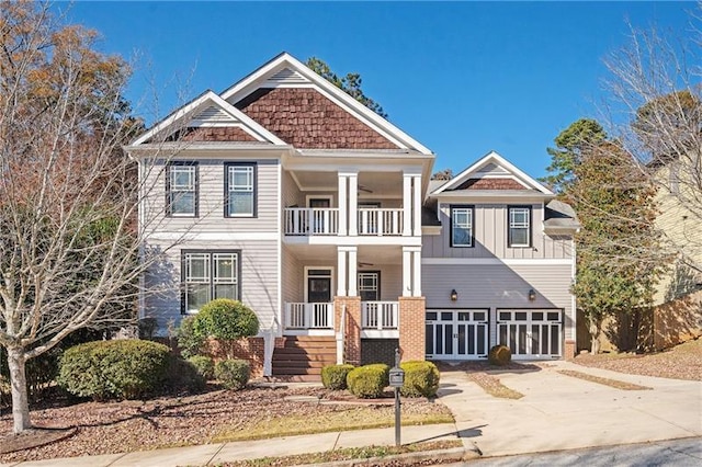 craftsman-style house with a balcony, a porch, concrete driveway, a garage, and board and batten siding