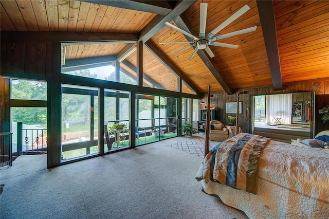 unfurnished bedroom featuring access to outside, wooden ceiling, beamed ceiling, and wood walls