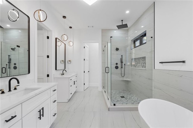 bathroom featuring vanity and an enclosed shower