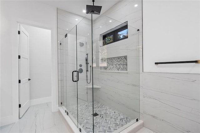 bathroom featuring an enclosed shower