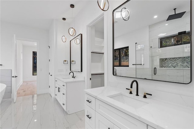 bathroom featuring vanity and walk in shower