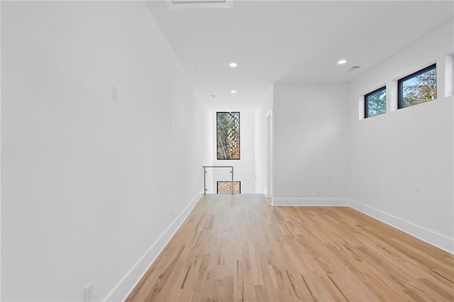 unfurnished living room featuring light hardwood / wood-style flooring