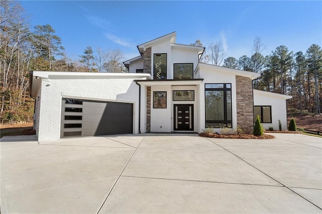 contemporary house featuring a garage