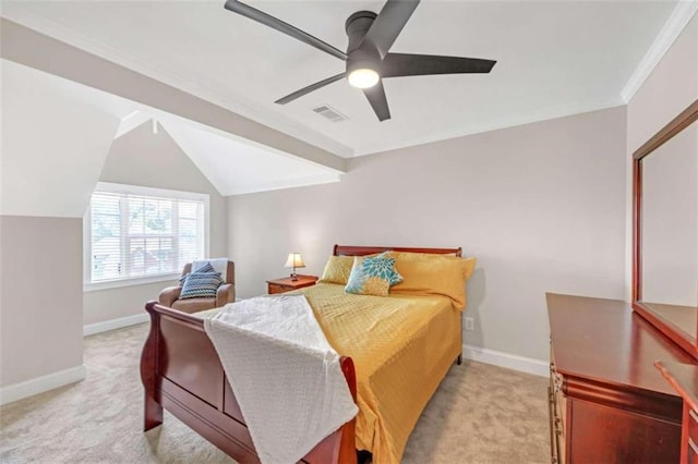 bedroom featuring light carpet, baseboards, vaulted ceiling, a ceiling fan, and crown molding