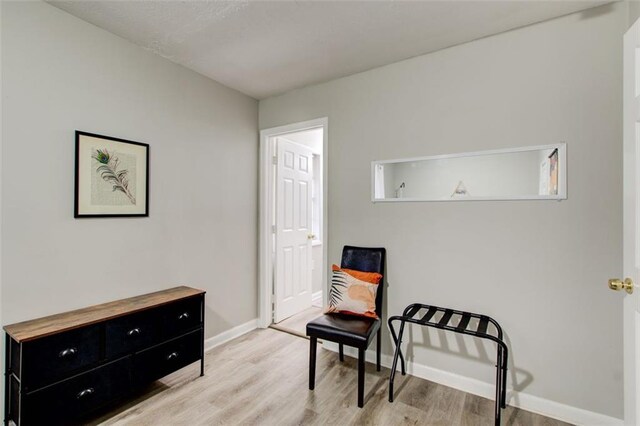 1351 Eason St NW, Atlanta, GA 30314 - living area featuring light wood-type flooring and baseboards