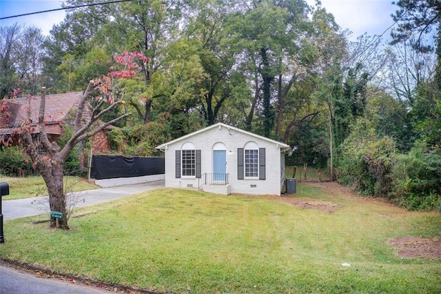 1351 Eason St NW, Atlanta, GA 30314 - view of front of home featuring a front yard, crawl space, and brick siding