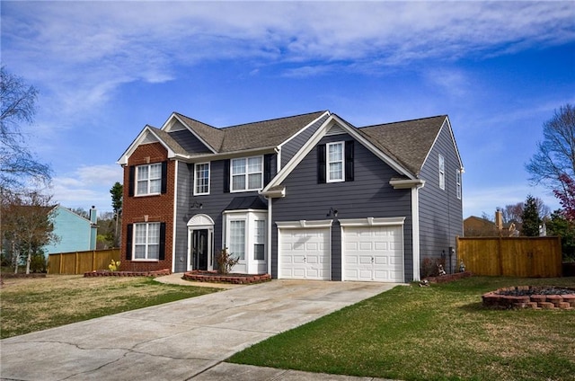 view of front of home featuring a garage and a front yard