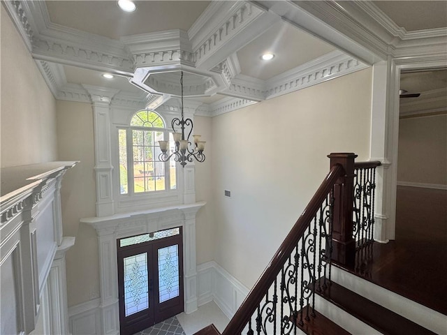 1417 Wind Chime Ct, Lawrenceville, GA 30045 - entryway with a decorative wall, french doors, wainscoting, a chandelier, and ornamental molding