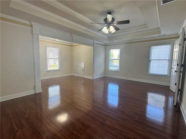 1417 Wind Chime Ct, Lawrenceville, GA 30045 - unfurnished room with a tray ceiling, dark wood-style flooring, a ceiling fan, and ornamental molding