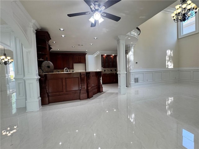 1417 Wind Chime Ct, Lawrenceville, GA 30045 - kitchen featuring a decorative wall, light marble finish flooring, a chandelier, refrigerator, and open floor plan