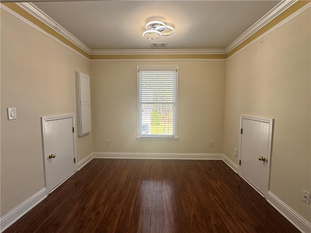 1417 Wind Chime Ct, Lawrenceville, GA 30045 - spare room with crown molding and dark wood-type flooring