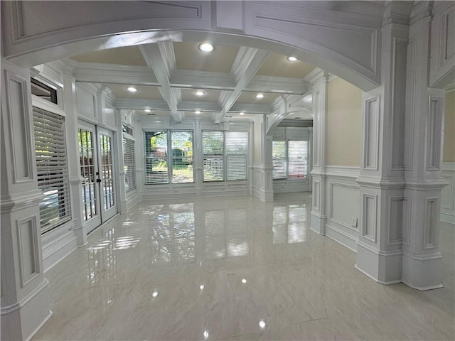 1417 Wind Chime Ct, Lawrenceville, GA 30045 - unfurnished sunroom featuring coffered ceiling, french doors, beamed ceiling, and arched walkways