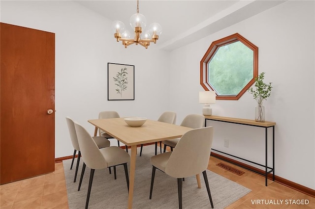 2419 Anderson Mill Rd, Austell, GA 30106 - dining area featuring a chandelier and light tile patterned floors