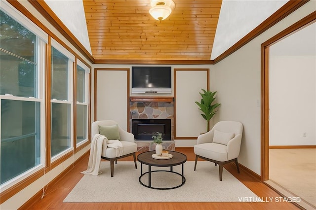 2419 Anderson Mill Rd, Austell, GA 30106 - living area featuring wood ceiling, lofted ceiling, a fireplace, and wood finished floors