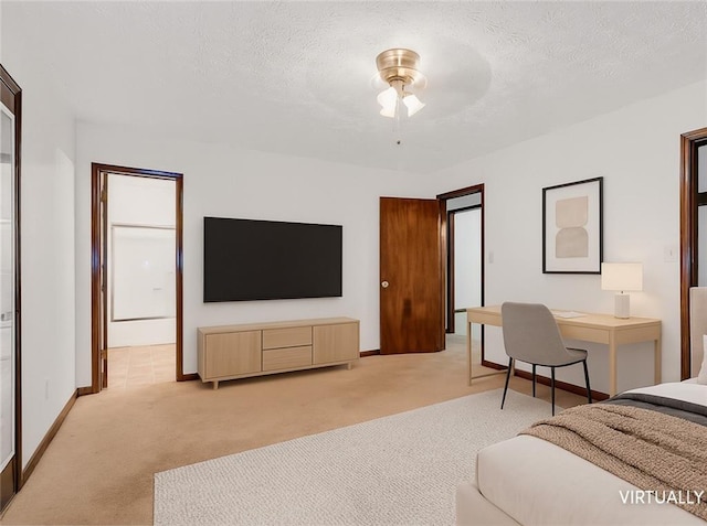 2419 Anderson Mill Rd, Austell, GA 30106 - bedroom featuring light carpet, a textured ceiling, and ensuite bathroom