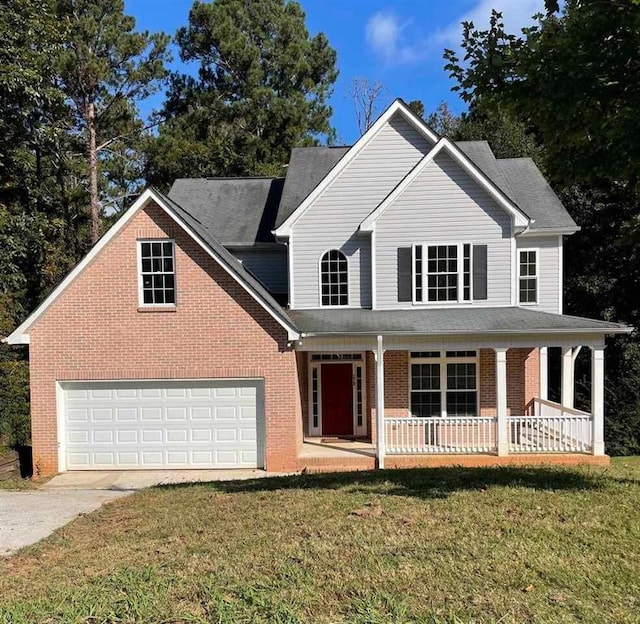 view of front of property featuring a porch, concrete driveway, a front yard, a garage, and brick siding