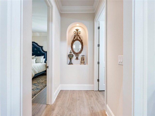 5964 Chickasaw Ln, Braselton, GA 30517 - hall featuring baseboards, ornamental molding, and light wood-style flooring