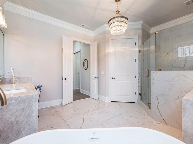 5964 Chickasaw Ln, Braselton, GA 30517 - bathroom with a freestanding tub, crown molding, a marble finish shower, marble finish floor, and an inviting chandelier