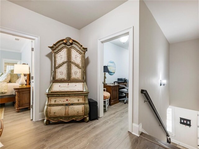5964 Chickasaw Ln, Braselton, GA 30517 - hallway with baseboards, wood finished floors, and an upstairs landing