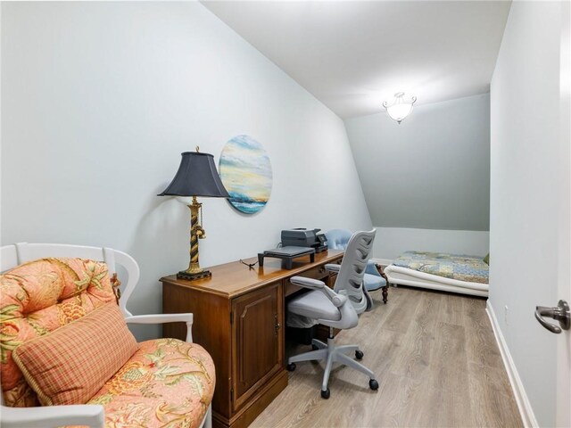 5964 Chickasaw Ln, Braselton, GA 30517 - home office featuring baseboards, vaulted ceiling, and light wood finished floors