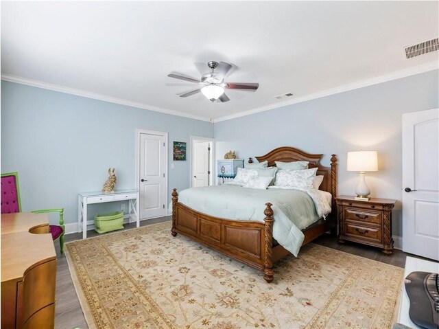 5964 Chickasaw Ln, Braselton, GA 30517 - bedroom featuring ornamental molding, visible vents, and wood finished floors