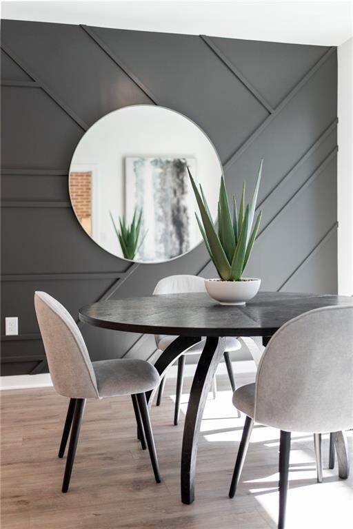 dining space featuring hardwood / wood-style flooring