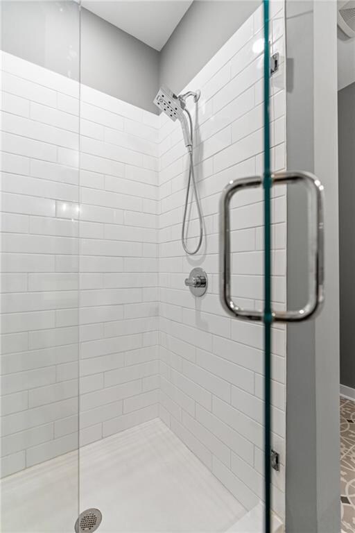 bathroom with an enclosed shower