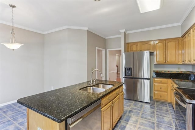 kitchen featuring a center island with sink, a sink, decorative light fixtures, dark stone counters, and appliances with stainless steel finishes