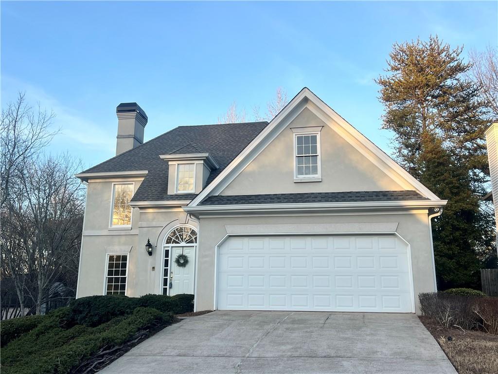 view of front of house with a garage