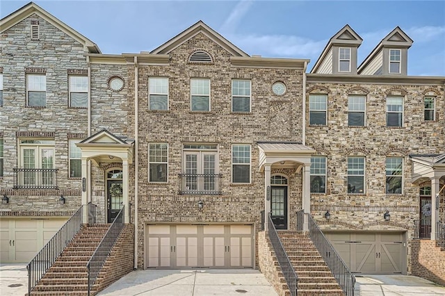 2433 Santa Rosa St, Alpharetta, GA 30009 - townhome / multi-family property with a garage, concrete driveway, and stairs