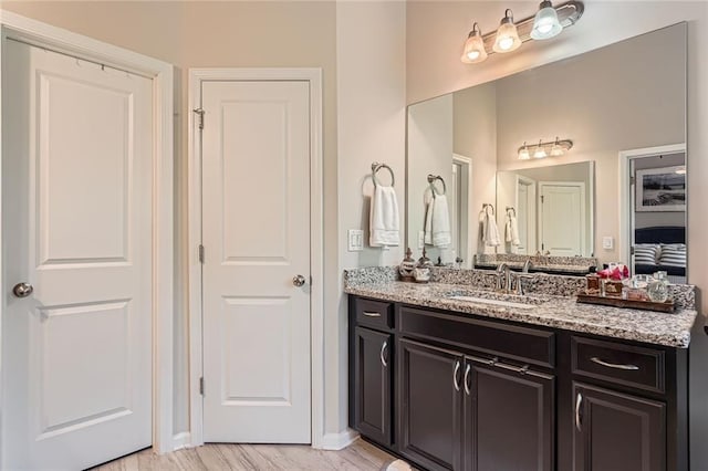2433 Santa Rosa St, Alpharetta, GA 30009 - bathroom featuring vanity and wood finished floors