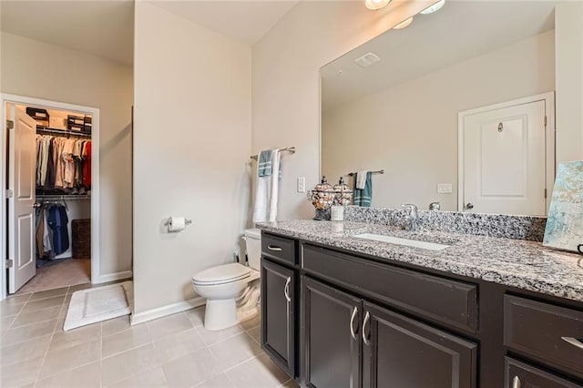 2433 Santa Rosa St, Alpharetta, GA 30009 - full bathroom featuring vanity, tile patterned floors, and a spacious closet