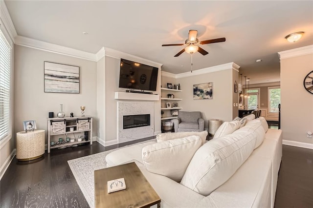 2433 Santa Rosa St, Alpharetta, GA 30009 - living area with a ceiling fan, a glass covered fireplace, dark wood-style floors, and ornamental molding