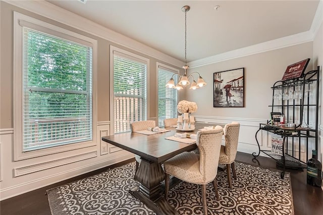 2433 Santa Rosa St, Alpharetta, GA 30009 - dining room with wood finished floors, a chandelier, a wainscoted wall, a decorative wall, and ornamental molding
