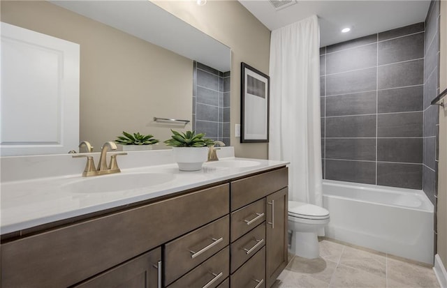 full bathroom featuring toilet, shower / tub combo, tile patterned floors, and vanity