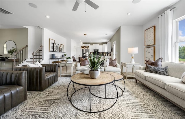 living room featuring ceiling fan